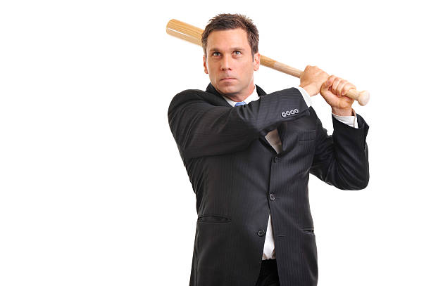 istock Businessman with Baseball Bat Isolated on White Background 157577309