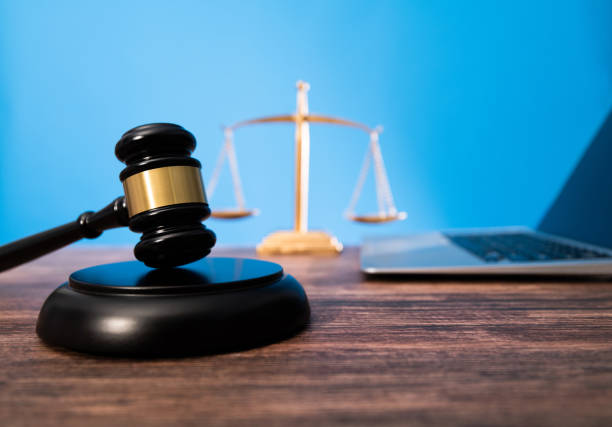 istock Gavel and laptop on the table 1575773225