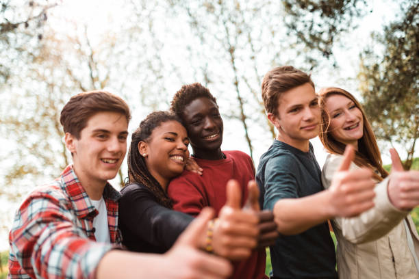 istock multiracial friends winning together 1575781941