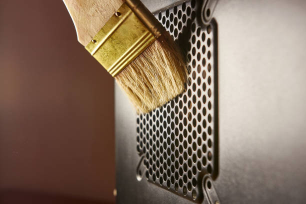 istock Dust contamination of the computer case grille. PC care and cleaning. 1575784013
