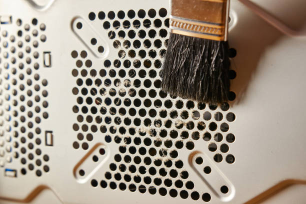 istock Dust contamination of the computer case grille. PC care and cleaning. 1575784542