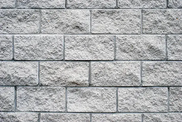 Photo of White granite brick wall texture