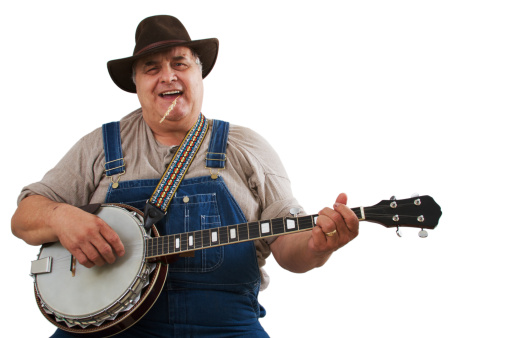 a man playing and singing with a banjo isolated on white.