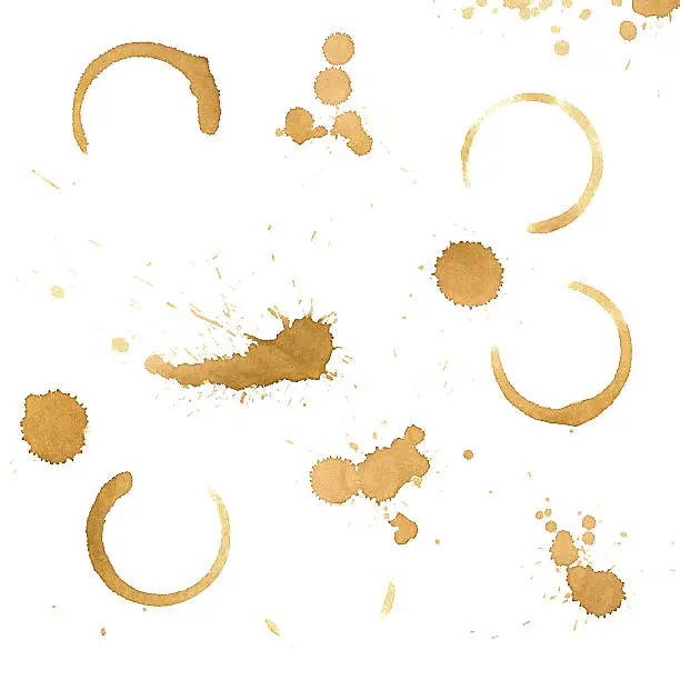 Photo of Various coffee drips and stains on a white background