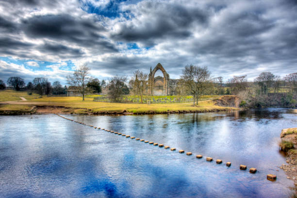 Bolton Abbey, North Yorkshire, England HDR image of Bolton Abbey, North Yorkshire, england on a winters day. With stepping stones over the River Wharfe river wharfe stock pictures, royalty-free photos & images