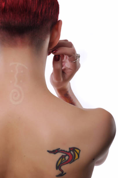 istock Tattoo on the neck 157580128