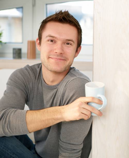 istock Portrait of smiling young man 157580732