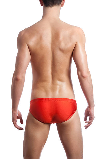 jovem em vermelho briefings - gay man gay pride homosexual racing briefs - fotografias e filmes do acervo