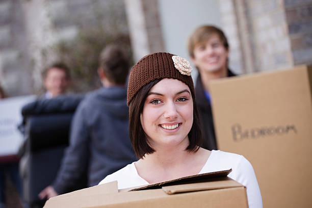 istock Young Woman Moving In 157581087