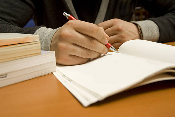 Student Ripping Assignment 80+ Kid Copying From Other Students Paper During Examination Stock ...