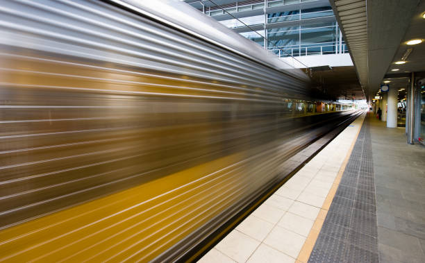 istock Train zooming through station 157581867