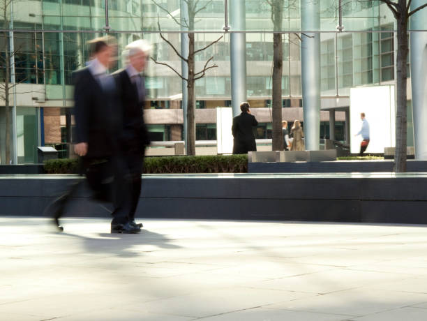 istock Two businessmen walking in financial district 157582112