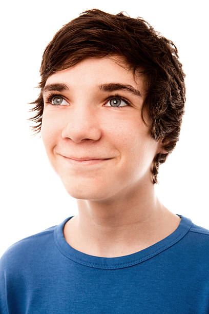 Closeup Portrait Of Teenage Boy Looking Up Stock Photo - Download Image Now  - 14-15 Years, Looking Away, One Person - iStock