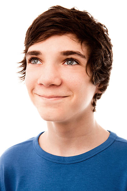 Closeup Portrait Of Teenage Boy Looking Up Stock Photo - Download Image Now - 14-15 Years, Looking Away, One Person - iStock Closeup Portrait Of Teenage Boy Looking Up Stock Photo - Download Image Now - 14-15 Years, Looking Away, One Person - iStock