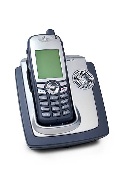 This image shows a close up view of a silver tone cordless push button telephone receiver.