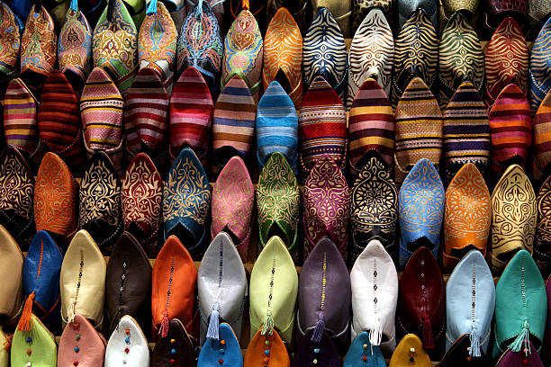 Colorful shoes for sale at street market in Marrakesh, Morocco stock photo