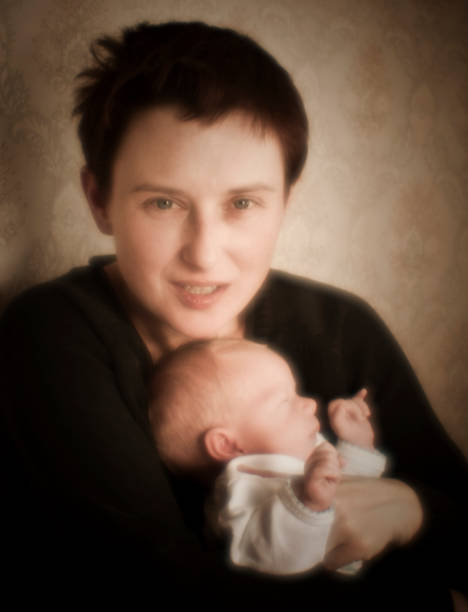 istock Mother with child. soft focus old style shot. 157582766