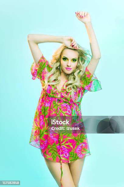 Beautiful Blonde Woman Posing In Colorful Tunic Stock Photo - Download Image Now - 20-24 Years, Adult, Adults Only