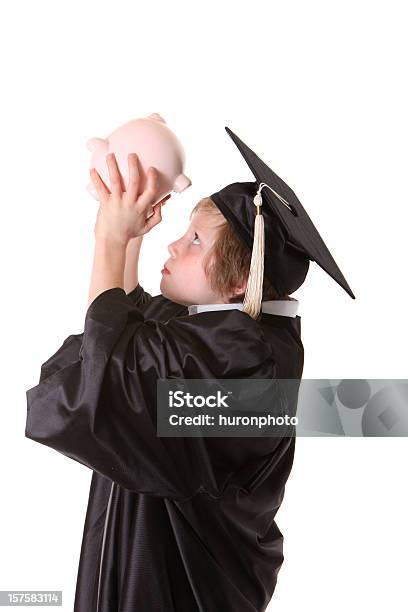 Foto de Faculdade De Economia Piggy Bank e mais fotos de stock de Criança - Criança, Cofre de porquinho, 8-9 Anos