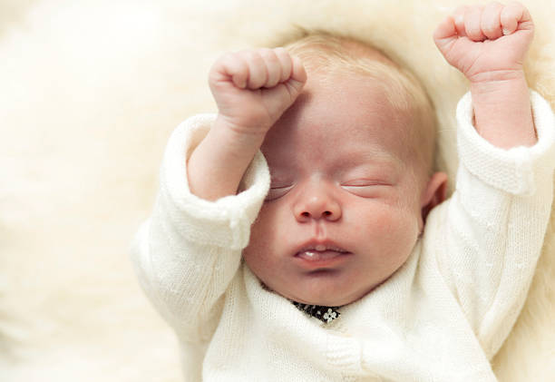 istock 3 weeks old newborn baby 157583266