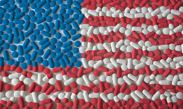 таблетки: американский флаг - capsule pill medicine red стоковые фото и изображения