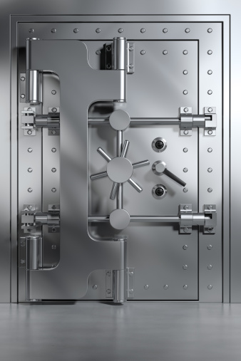 A closed bank vault door. 3D render with HDRI lighting and raytraced textures.