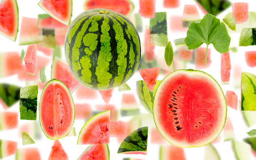 Abstract background made of Watermelon fruit pieces, slices and leaves isolated on white.