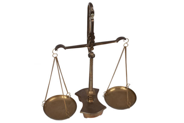 istock Bronze traditional balance scale. 1575846229