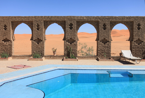 Beautiful arches by swimming pool in Sahara desert, Erg Chebbi Dunes, Morocco. XXXL Canon 5D Mark II. Similar:    