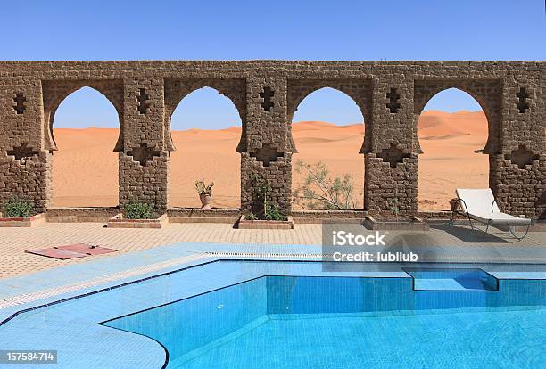 Beautiful Arches By Swimming Pool In Sahara Desert Morocco Stock Photo - Download Image Now