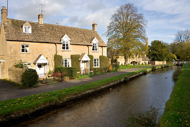 istock England, Gloucestershire, Cotswolds, idyllic old cottages at Lower Slaughter 157584872