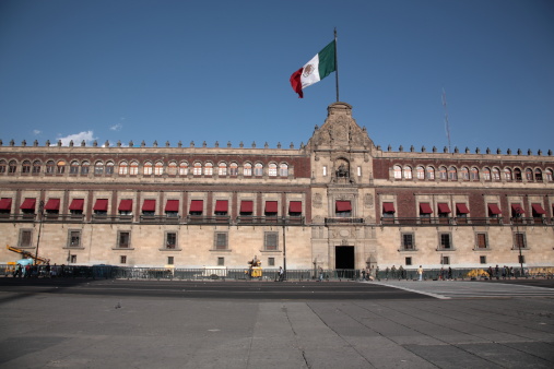 Partial view of Puerta del Sol Square in the morning, Madrid, Spain. Royal House of the Post Office (Real Casa de Correos) is an eighteenth century building,  currently serves as the office of the President of the Community of Madrid.