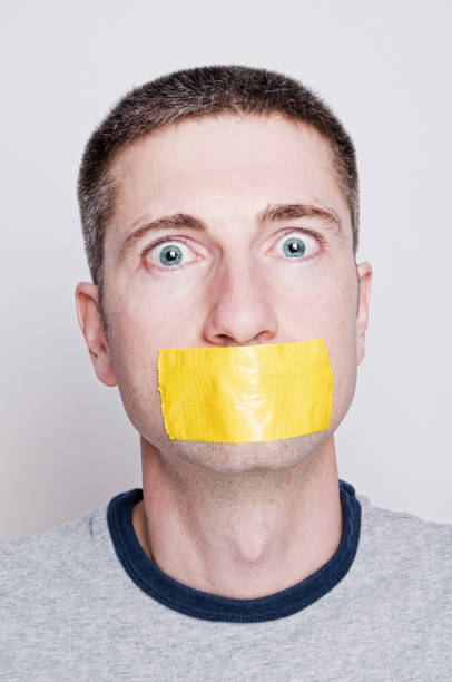 istock Fear, Man in Duct Tape, Terrified Expression 157585112