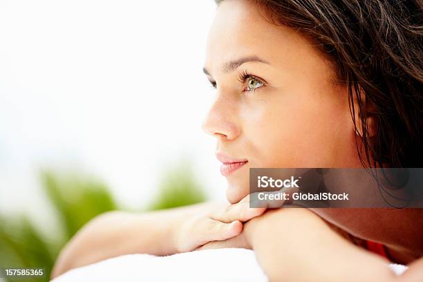 Closeup Of A Young Female Resting Outdoors Stock Photo - Download Image Now - Side View, 20-24 Years, 20-29 Years