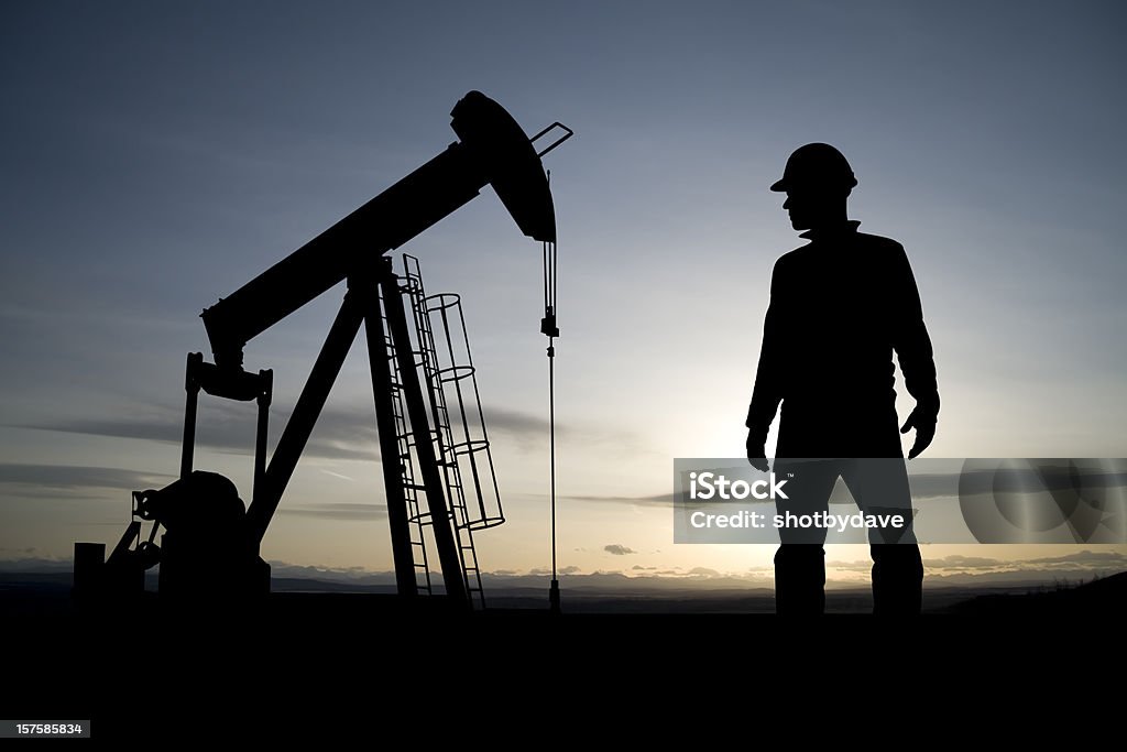 Bohrarbeiter und Pumpjack - Lizenzfrei Bergbau Stock-Foto