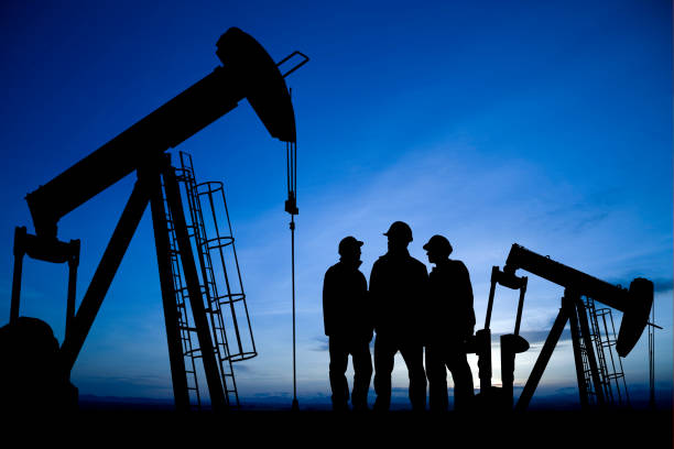 istock Three Men Meet in an Oilfield 157585843