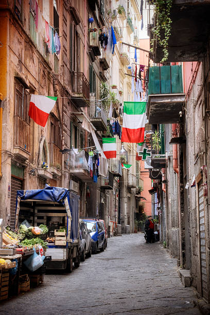 Italian Culture Side street in the historic center of Naples Italy. naples market stock pictures, royalty-free photos & images