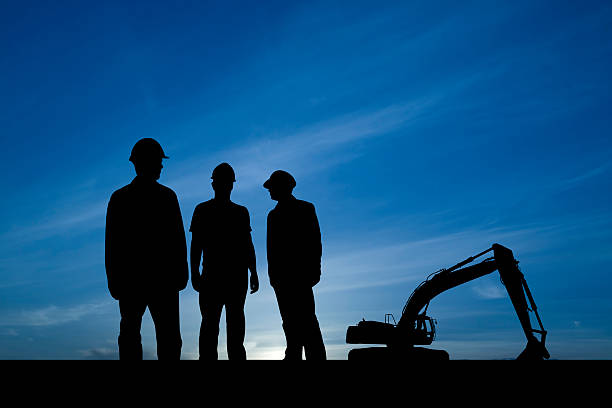 3 つの男性は、建設現場 - industrial equipment industry growth silhouette ストックフォトと画像