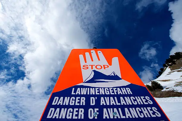 Avalanche warning sign in the mountains