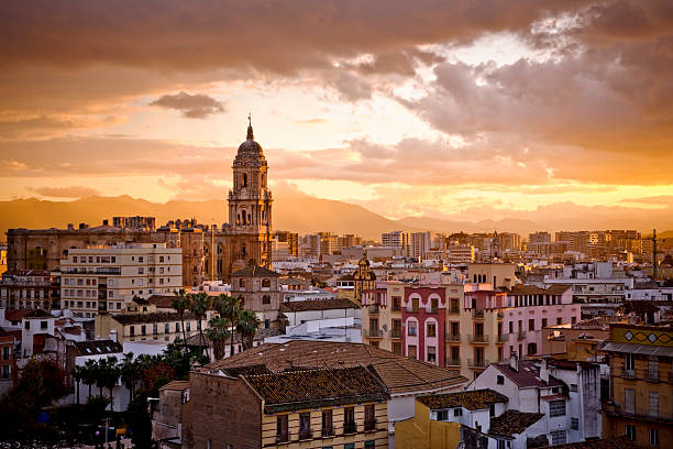 Malaga city View of the city of Malaga, capital of the Costa del Sol (southern Spain), at the sunset. málaga province photos stock pictures, royalty-free photos & images
