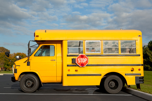 Front part of yellow school bus children educational transport.