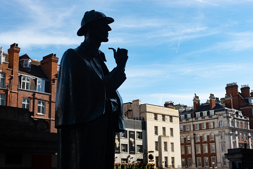 London, UK. July 9th 2022
Statue of Sherlock Holmes by sculptor John Doubleday stands near the supposed site of 221B Baker Street, near to the Sherlock Holmes Museum and Baker Street Underground Station, London.