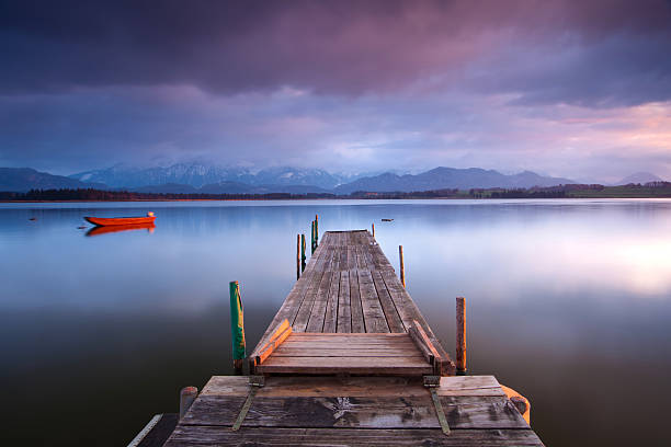 istock tranquil scene with boat at lake hopfensee 157586995