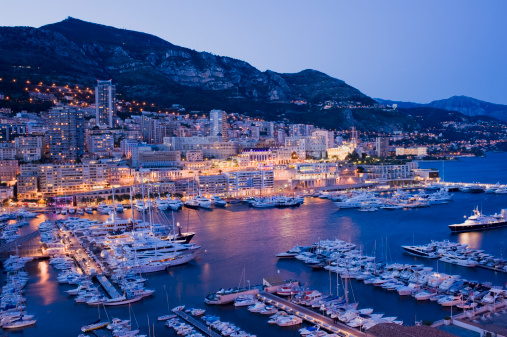 Monte Carlo city panorama. View of luxury yachts and apartments in harbor of Monaco, Cote d'Azur