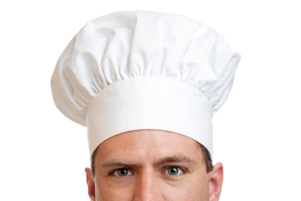 Eyes of a cook with white chef hat isolated on white background. You might also be interested in these: