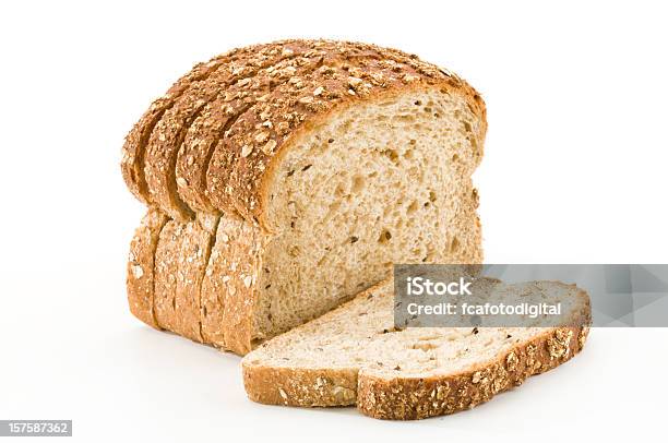 Detailed Closeup Of Sliced Grain Bread On White Background Stock Photo - Download Image Now