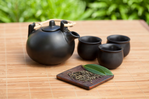 Tea set on bamboo mat