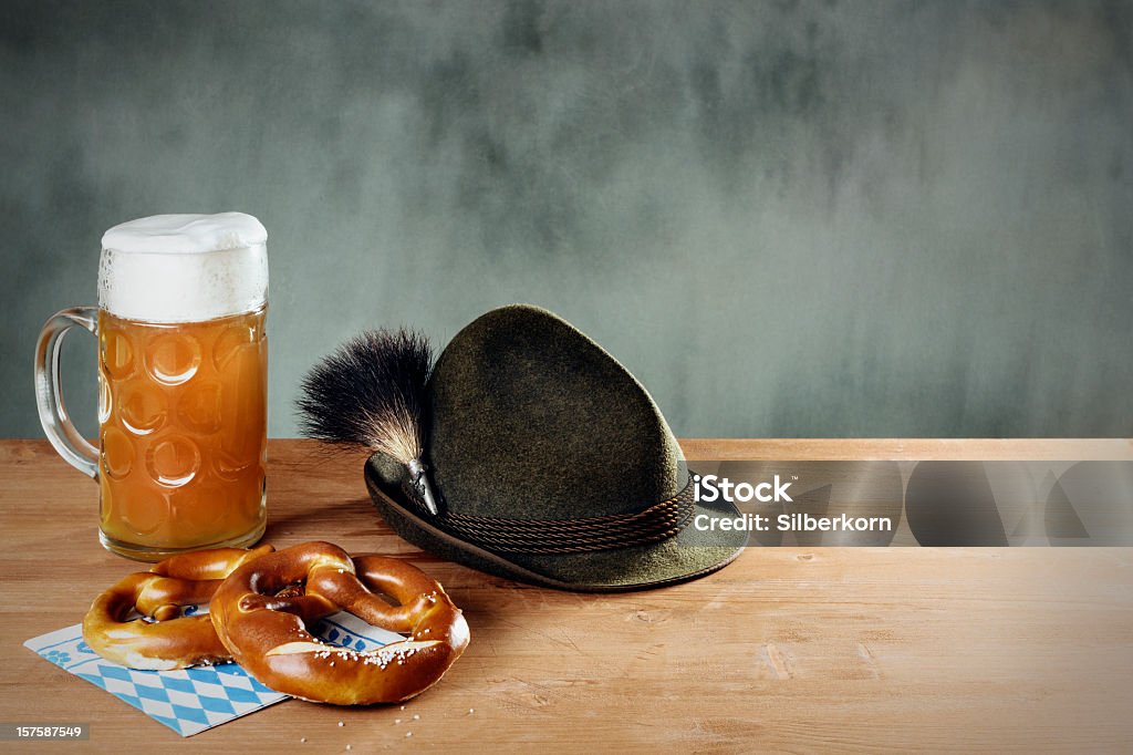 Masskrug beer, Pretzel and Hat with Gamsbart  Gamsbart Stock Photo