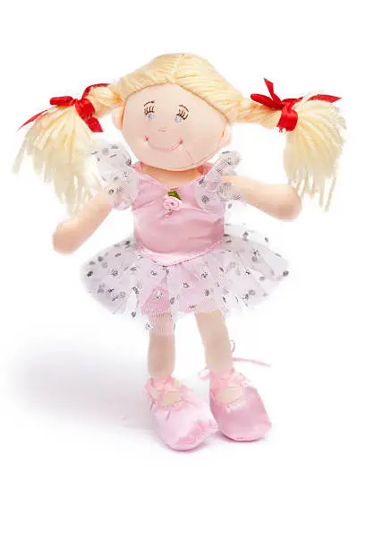 ballerina doll dressed with pink leotard