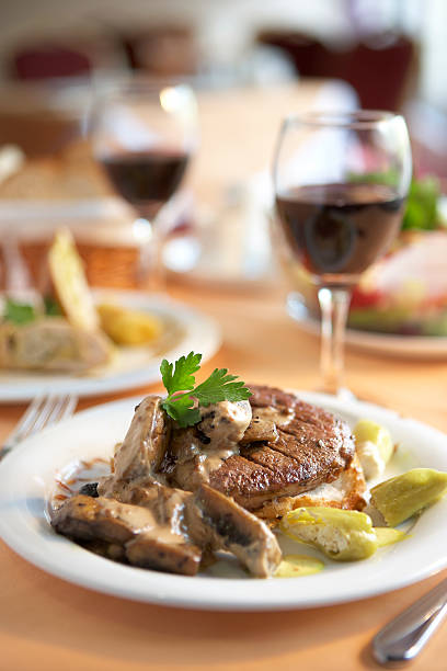Close up on italian traditional northern food on a restaurant table. Many dishes are visible.